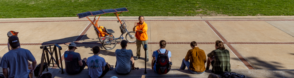 Teacher outside with class.