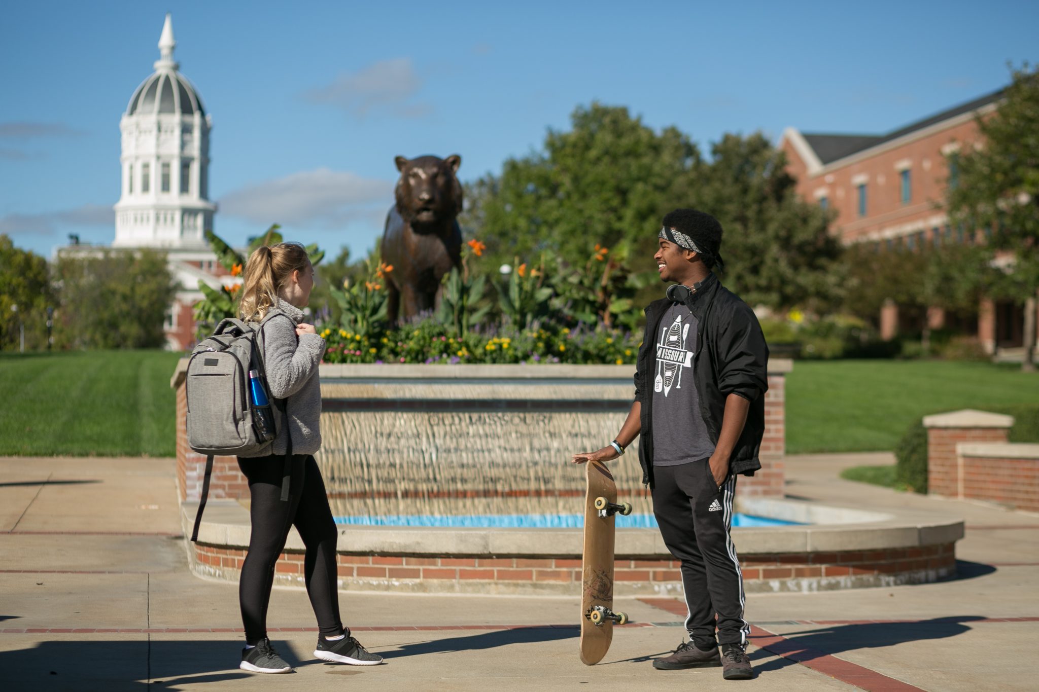 Two students talk on Carnahan Quadrangle