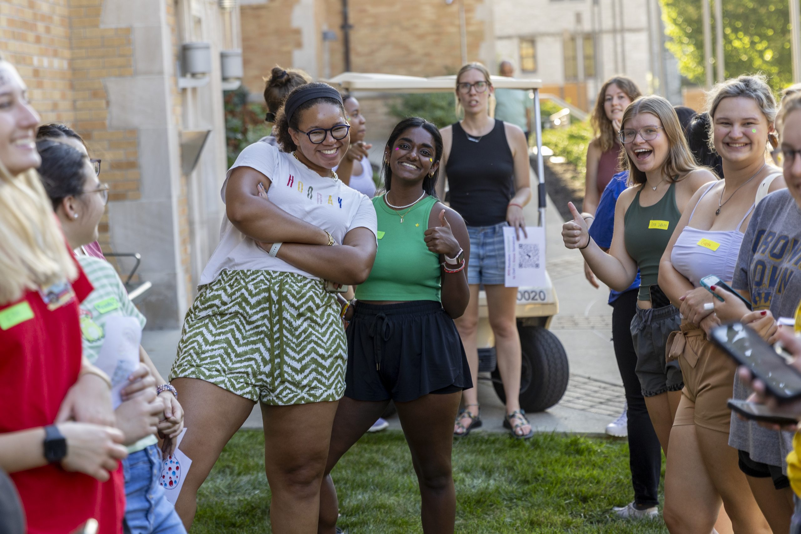 Students make door decorations, take photos together and socialize outside of Johnston Hall