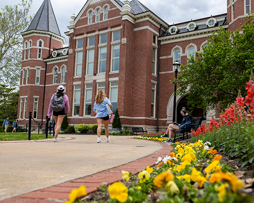 Students walking on campus.